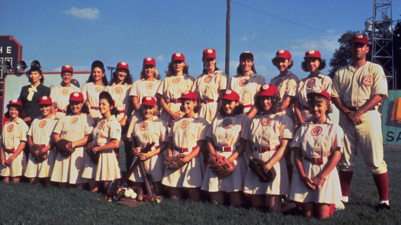 a group photo of a womens baseball team